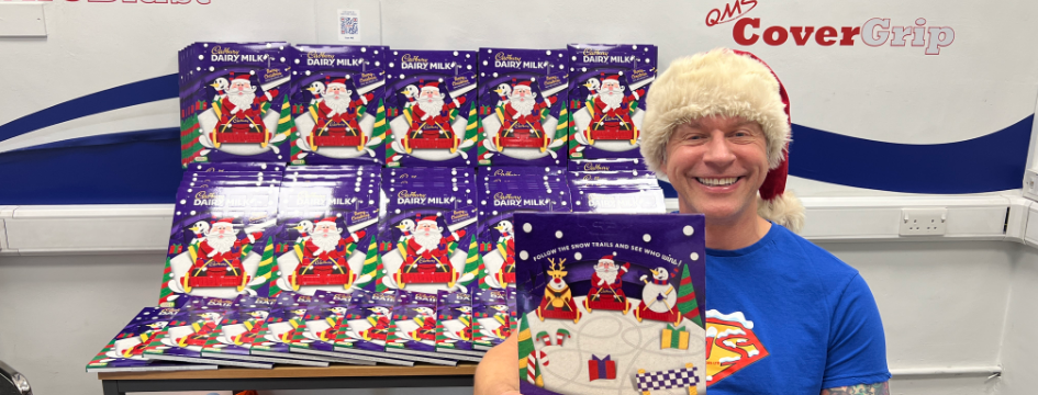 Greg stood in front of Christmas Calendars