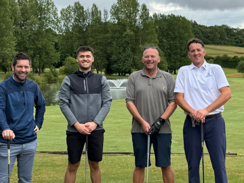 Group of four with chippers team photo