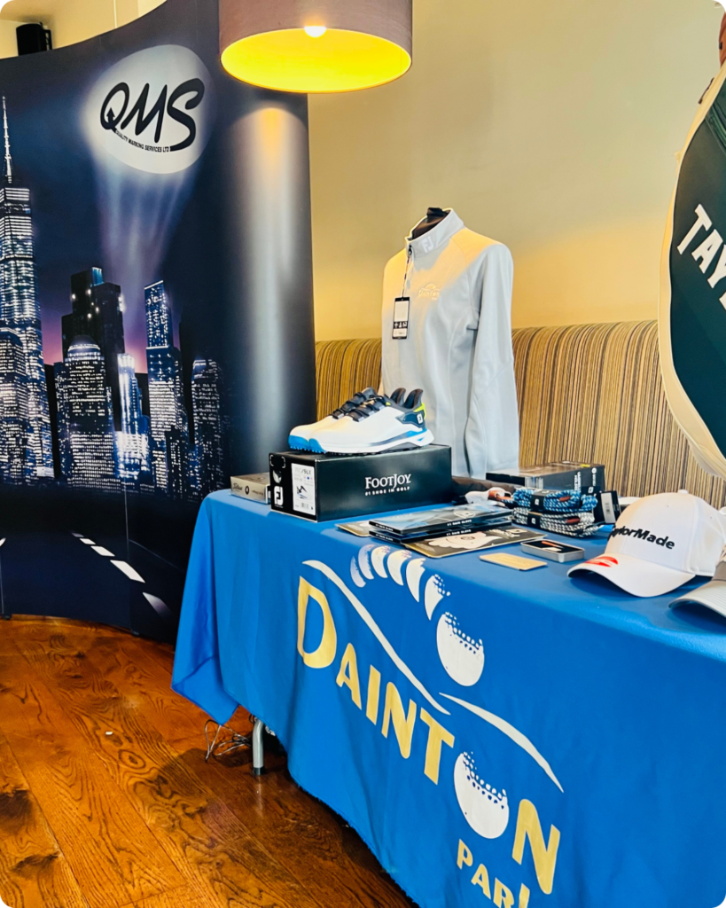 Prize Table filled with various levels of golf related products