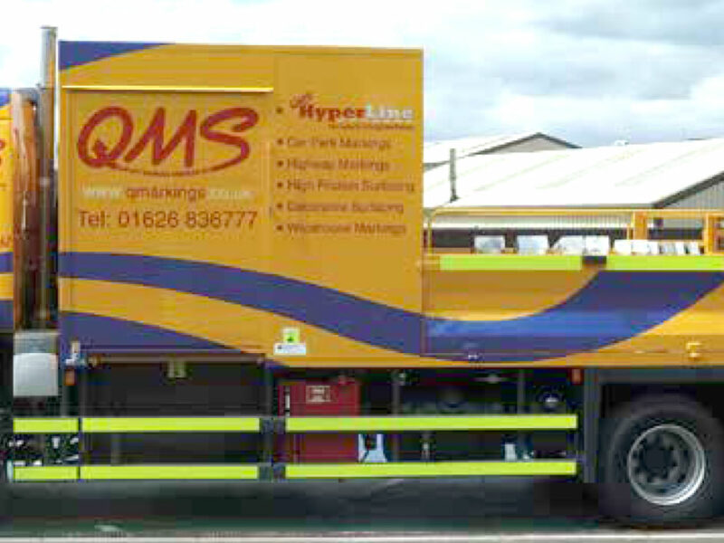 QMS vehicle on the road