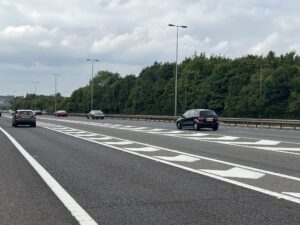 main road with cars