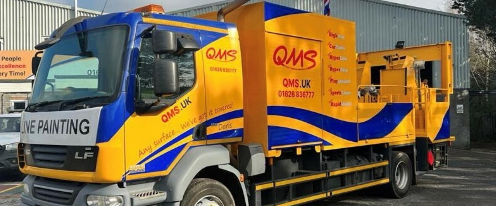 QMS Line marking and surfacing lorry with the qms branding