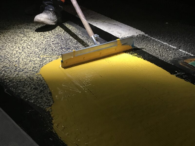 laying down surfacing