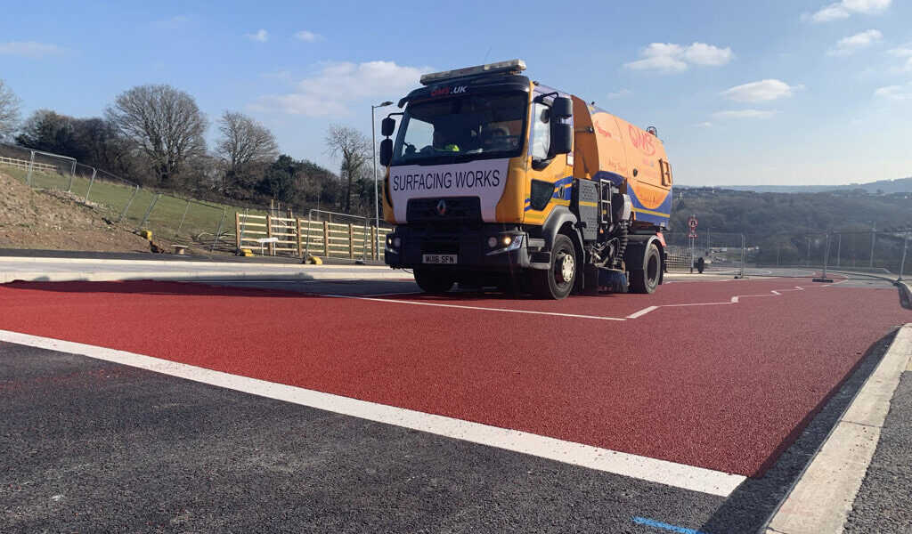 High-Friction Surfacing Red with QMS vehicle