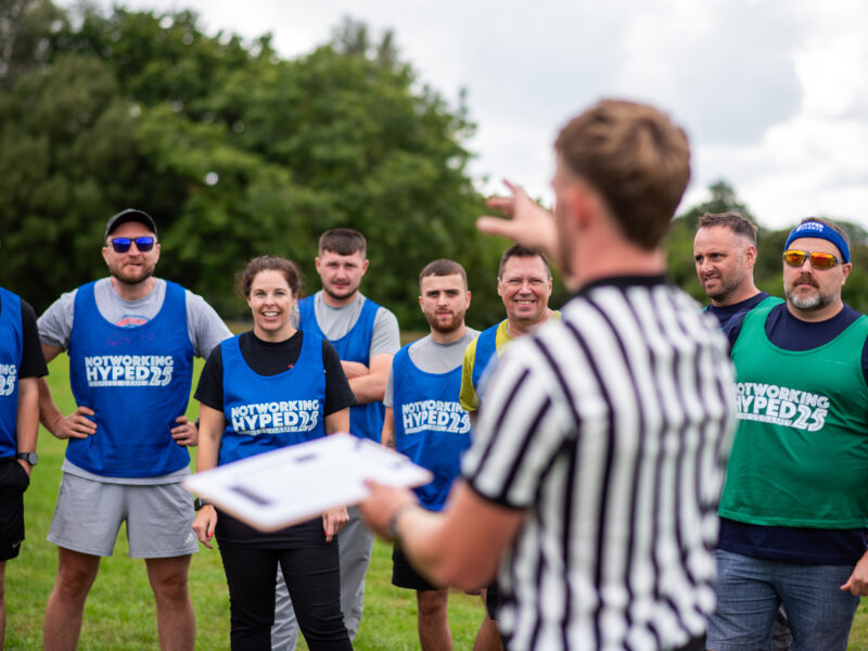 Networking Hyped 2025 Games - Referee and People in Background