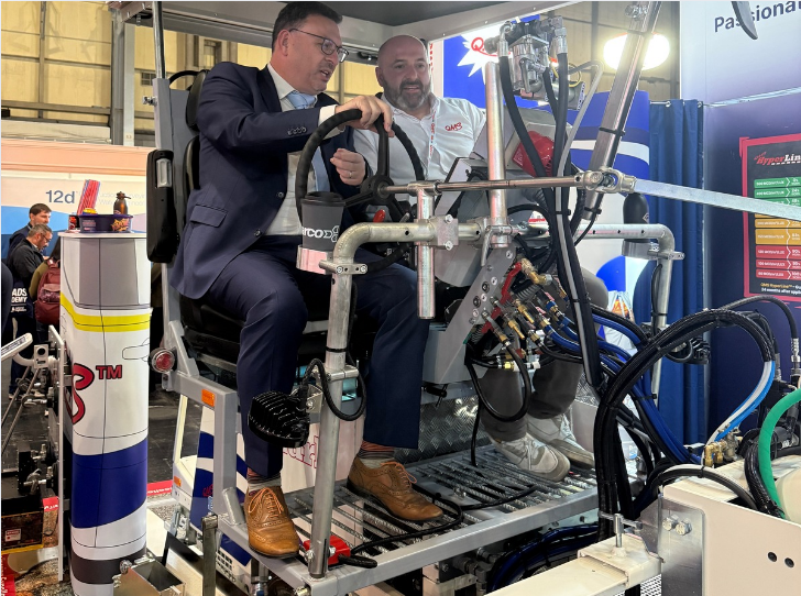 Men Operating MMA Machine