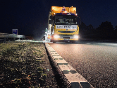 Line painting side of road truck