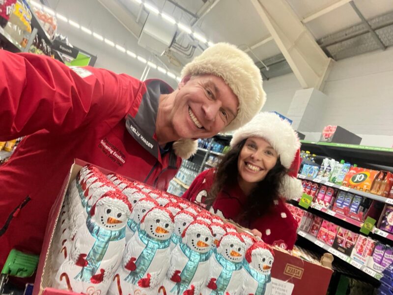 Greg Clark and Natasha Cummings from QMS with trolley of food for PATH Torbay Charity