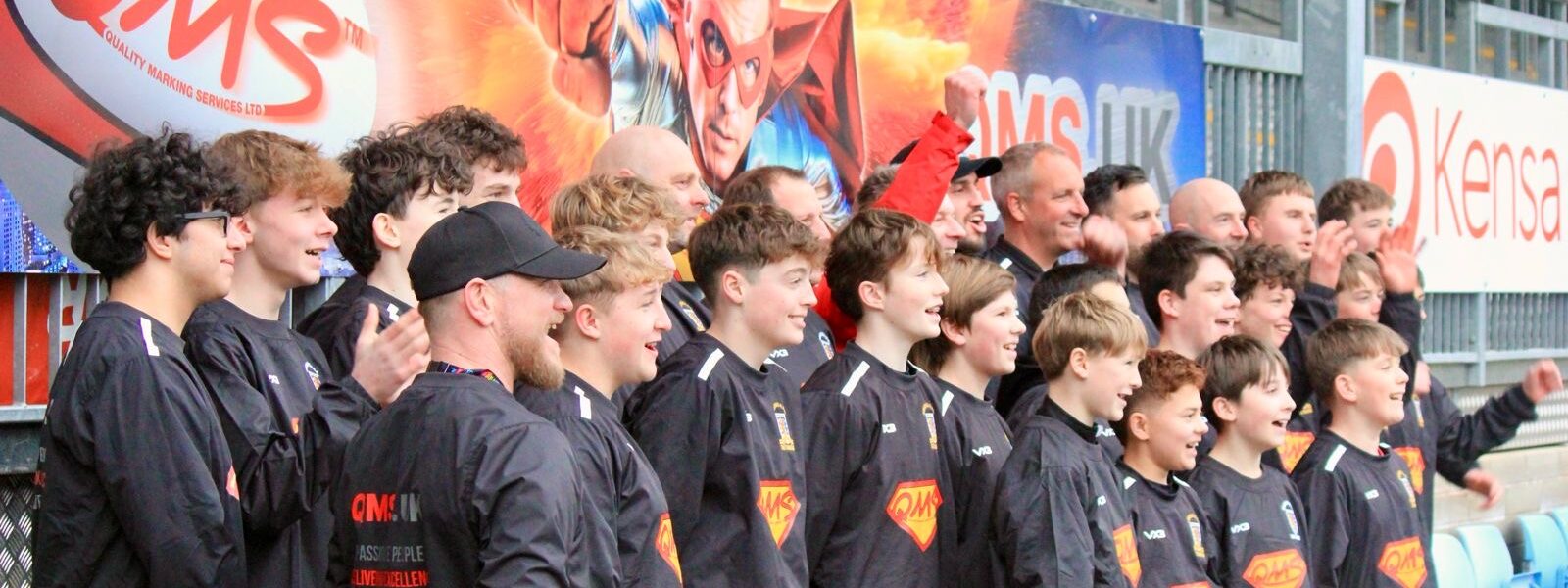 Brixham U14's and Ethan Roots at Sandy Park by QMS banner