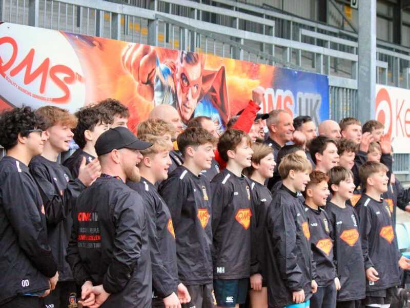 Brixham U14's and Ethan Roots at Sandy Park by QMS banner