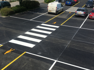 black and white hazard markings car park