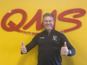 Greg Clark QMS with Brixham Rugby U14's shirt