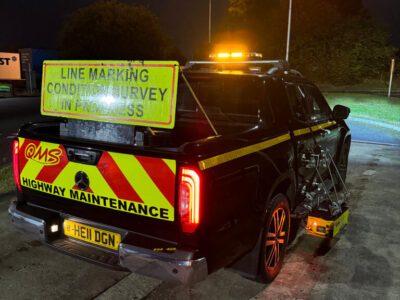 Line marking condition survey in progress night time